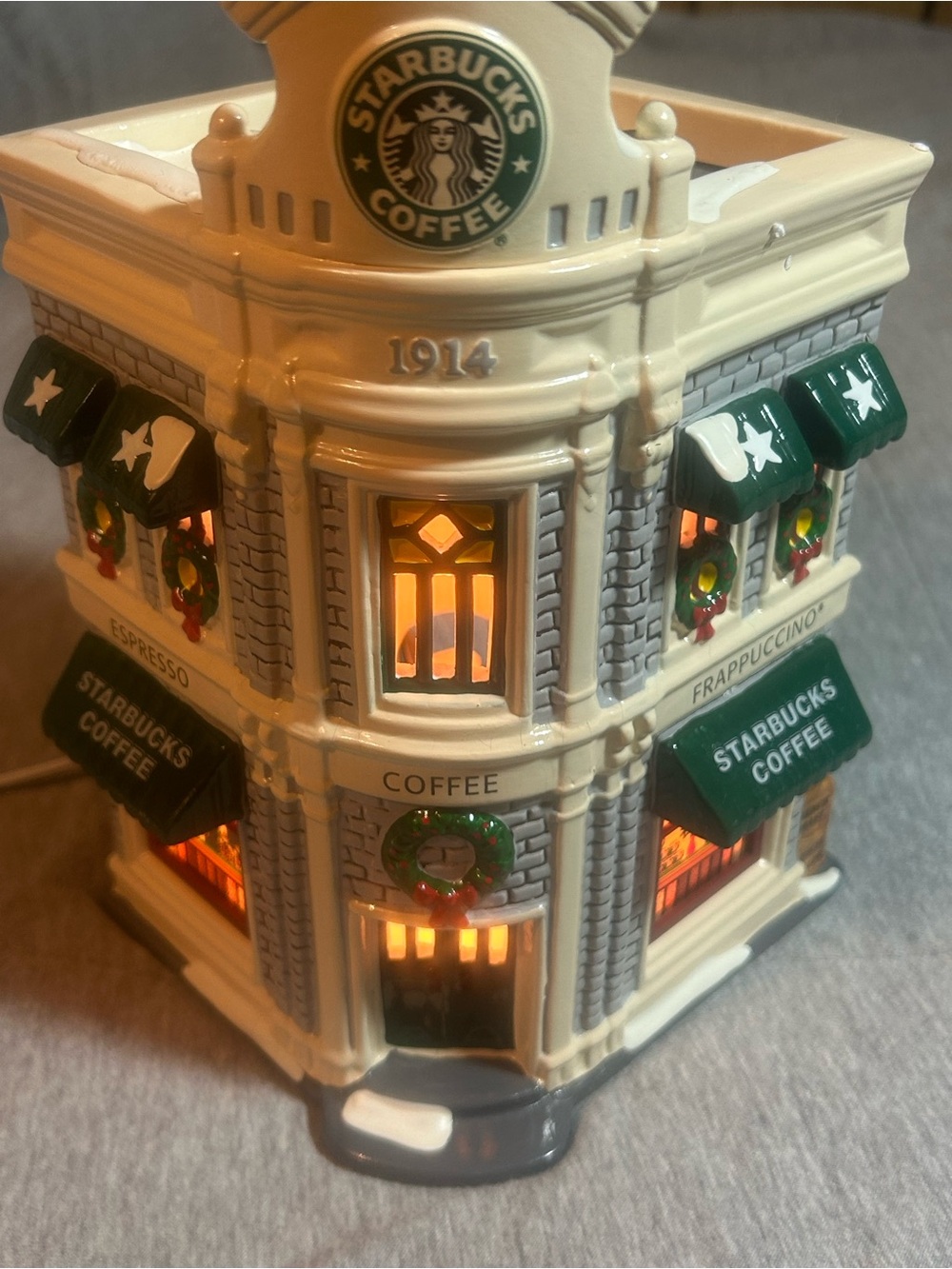 Starbucks Cream Ceramic Holiday Storefront with Green Awnings